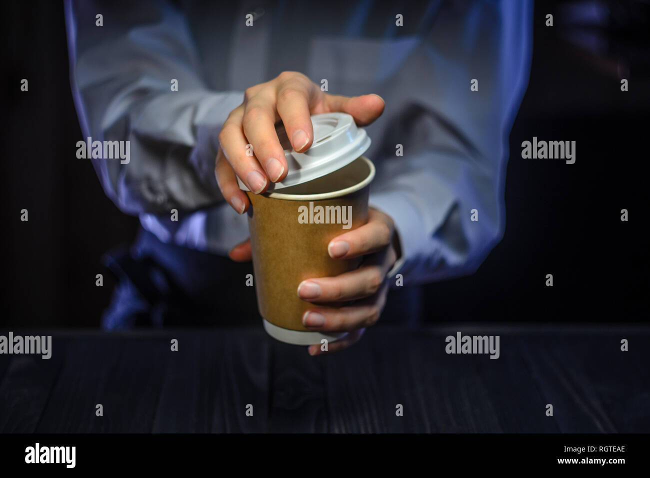 Barista serves coffee to the client. Hands Paper cup Bar counter ...