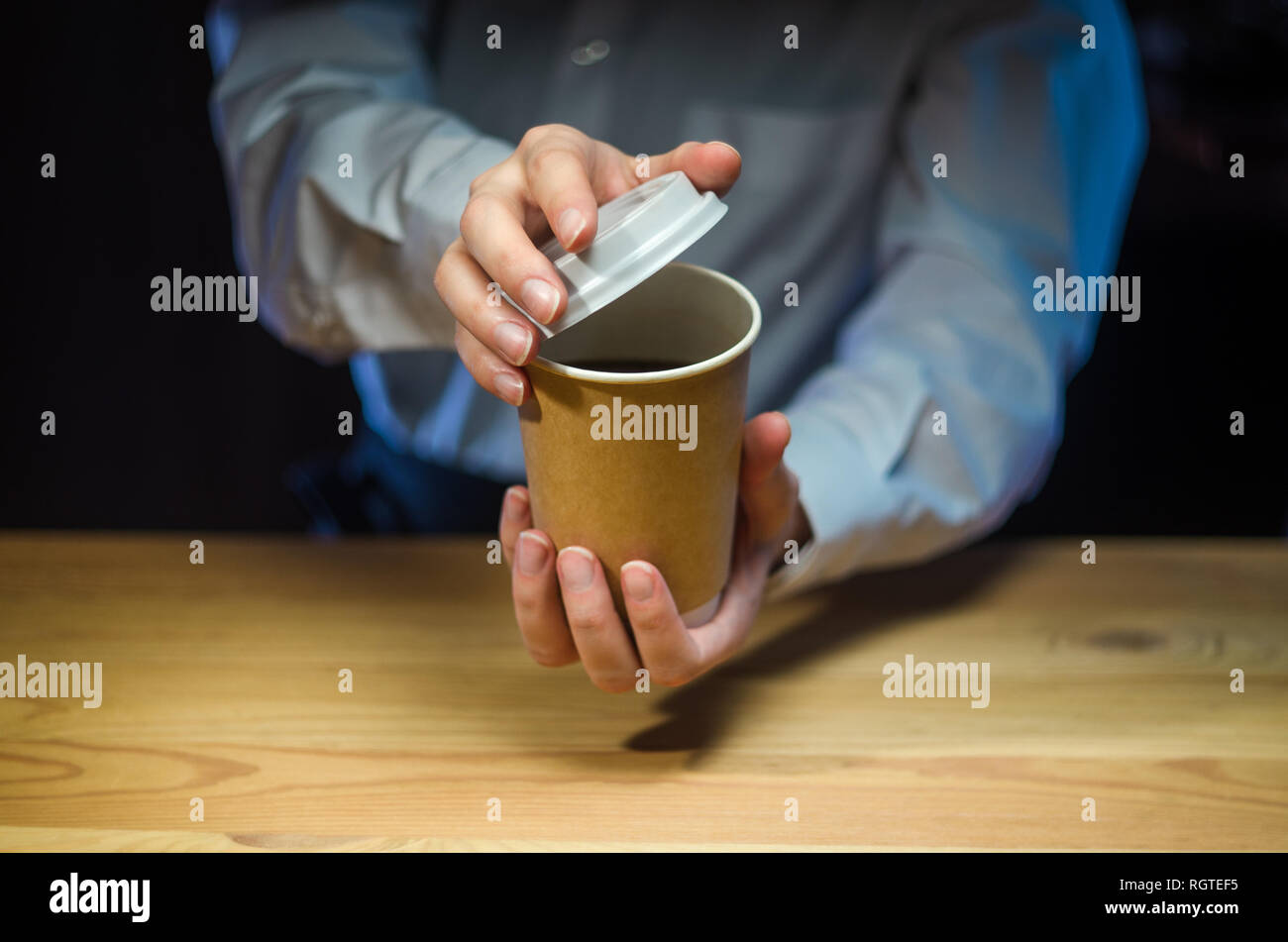 Barista serves coffee to the client. Hands Paper cup Bar counter ...
