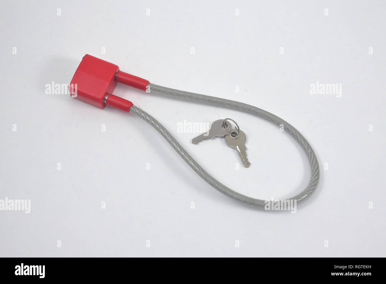 Locks and keys used to safely secure a firearm from being used. Stock Photo