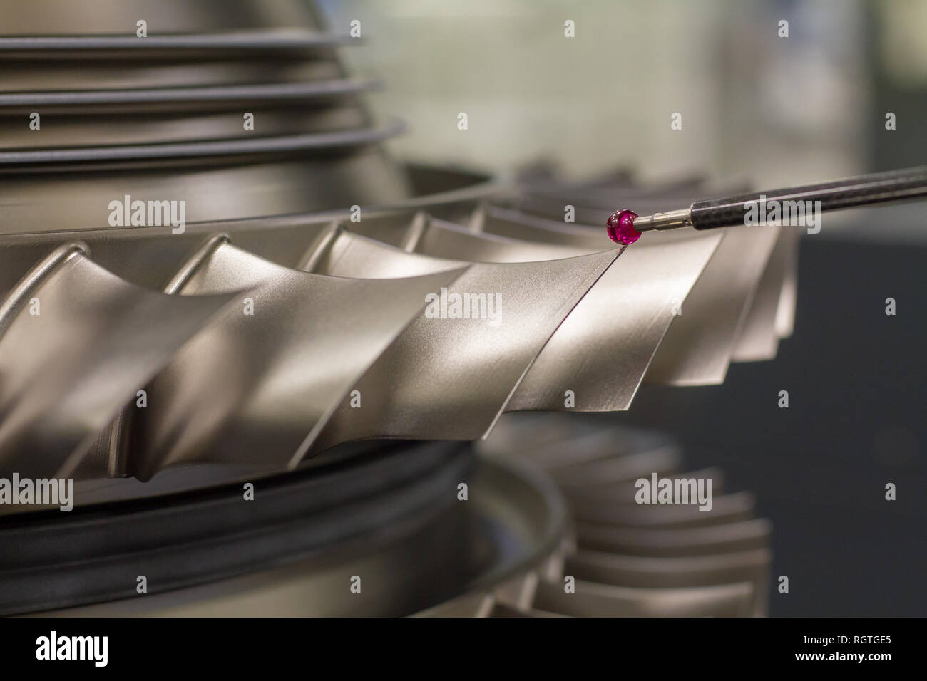 inspect dimension metal parts by CMM after machining process in industrial factory Stock Photo