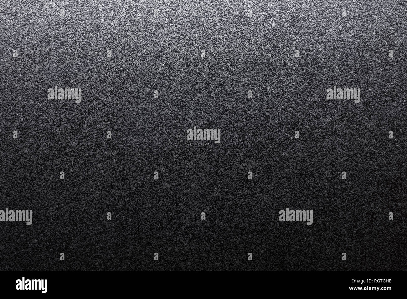 Closeup of black, rough background lit with dim light Stock Photo - Alamy
