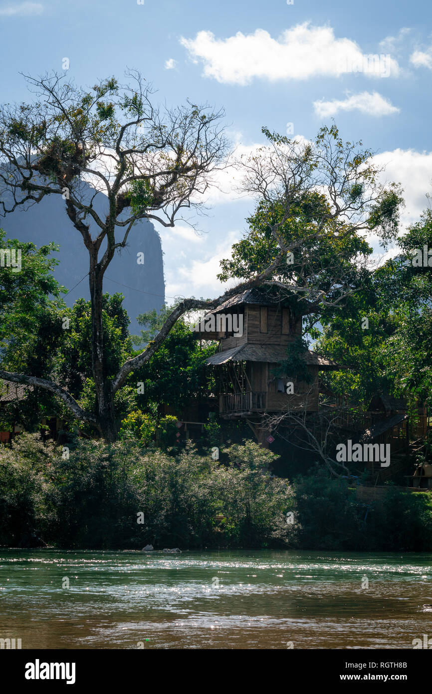 Tree House at the nam song river in Vang Vieng, Laos Stock Photo
