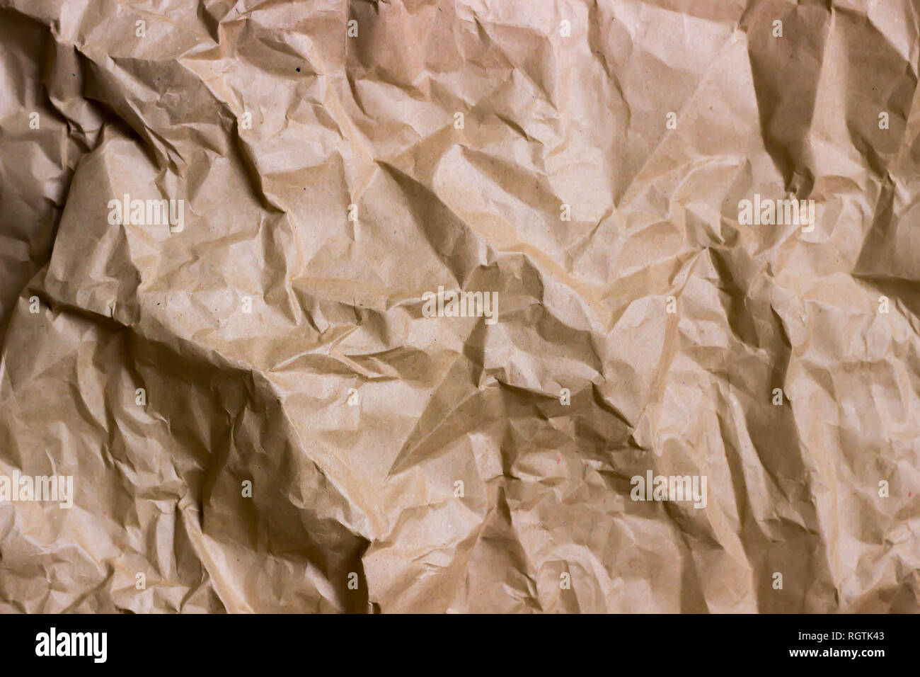 Brown wrinkle recycle paper background. Texture of crumpled paper. Texture  of rumpled old paper close-up Stock Photo - Alamy