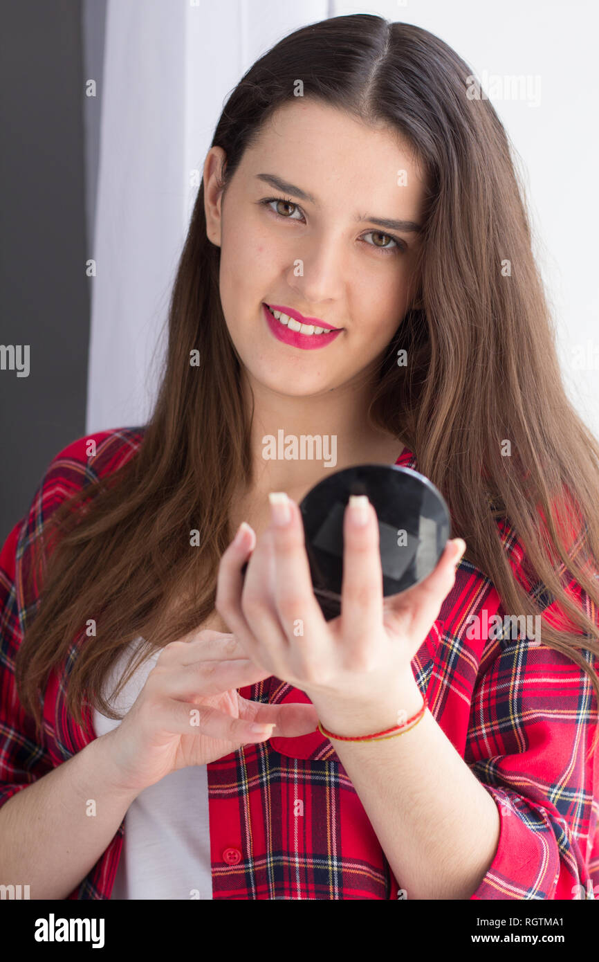 Teenage girl applying makeup hi-res stock photography and images - Alamy