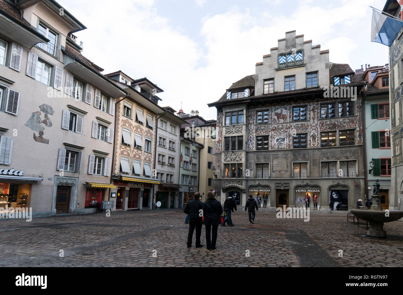 Painted facades on a building in Hirschenplatz in Luzern old quarter in