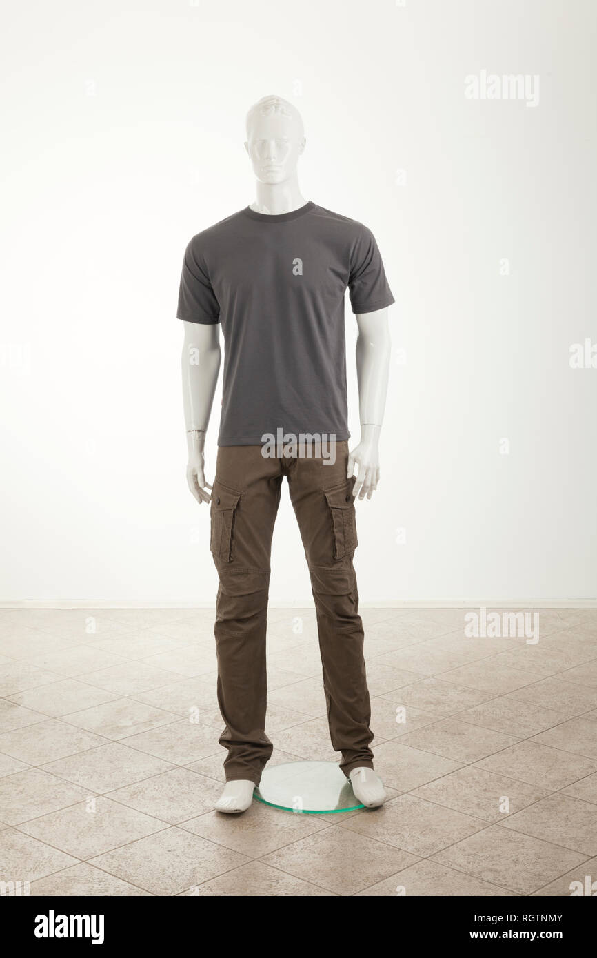 Mannequins with grey shirt, isolated on white Stock Photo