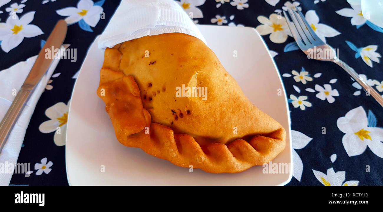 An empanada, a type of pastry baked or fried in Hispanic cultures