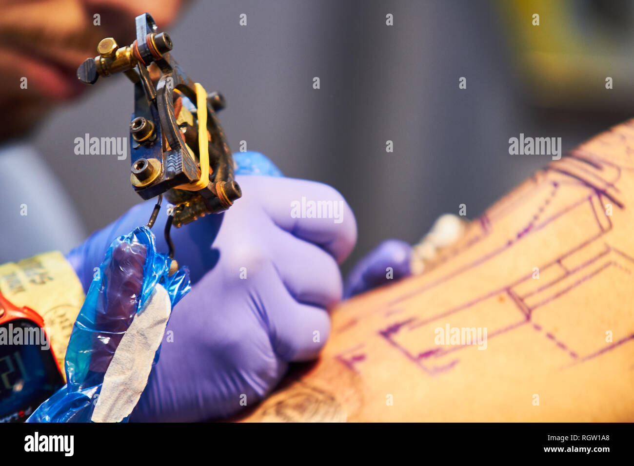 Young artist man tattooing hi-res stock photography and images - Alamy