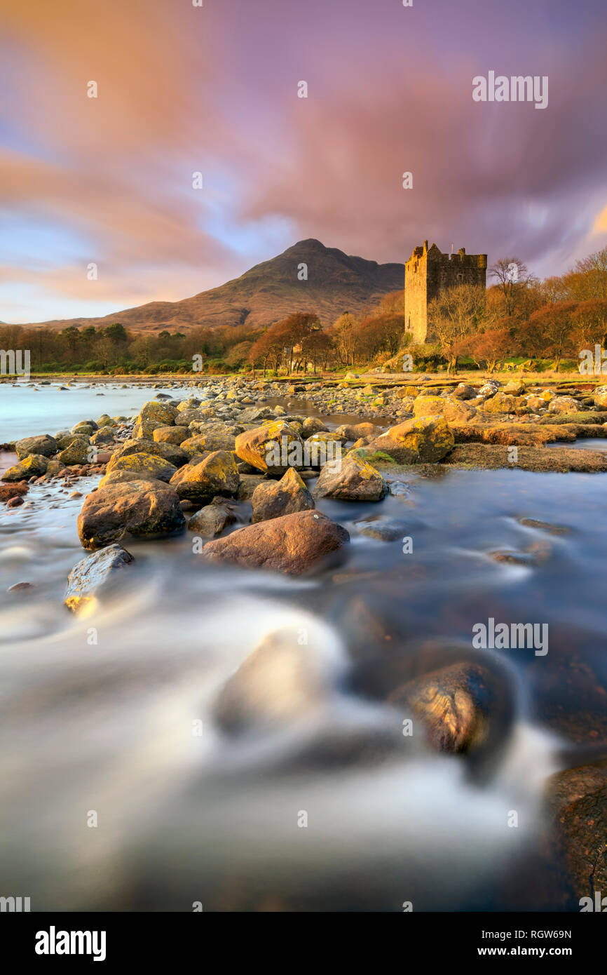 Moy Castle at Loch Buie on the Isle of Mull captured at sunset. Stock Photo