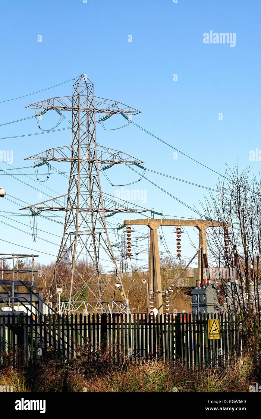 Electricity pylons and substation in New Haw Surrey England UK Stock Photo