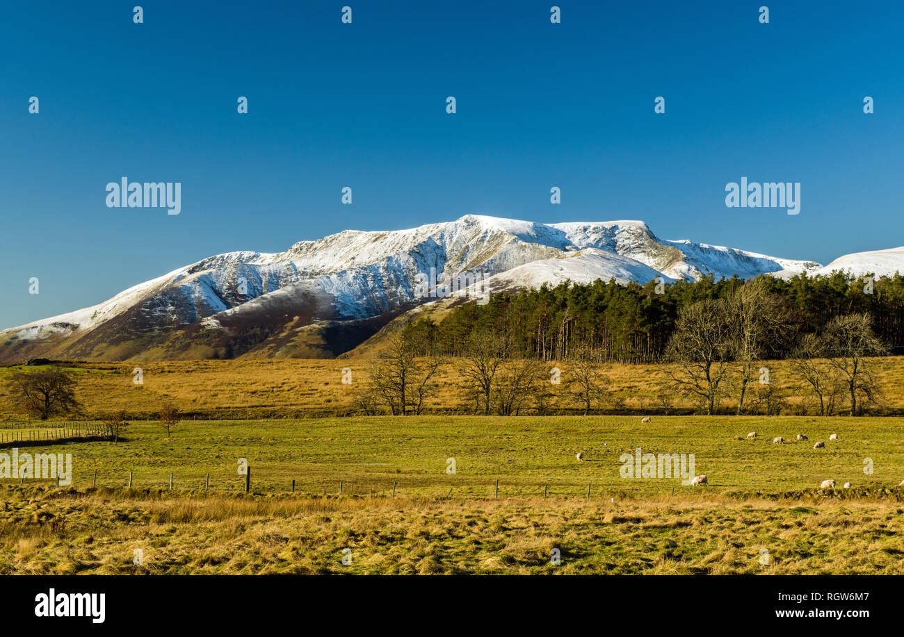 Snow capped Blencathra seen from Troutbeck Head in the Lake District National Park, Cumbria. The National Park is a UNESCO World Heritage Site. Stock Photo