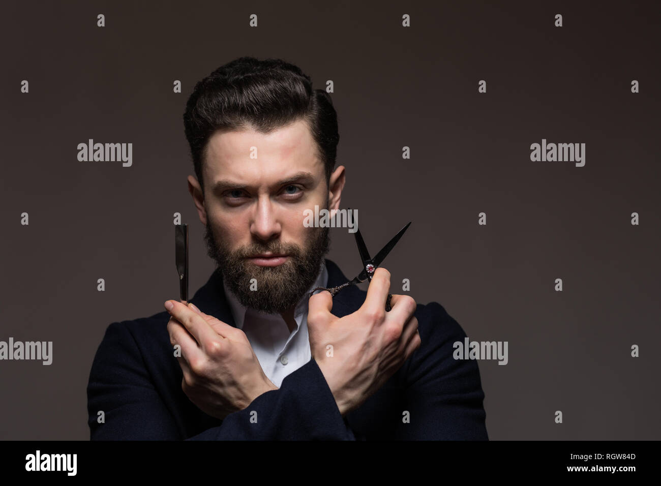 Bearded Man Caucasian Hipster With Moustache Holding Scissors And