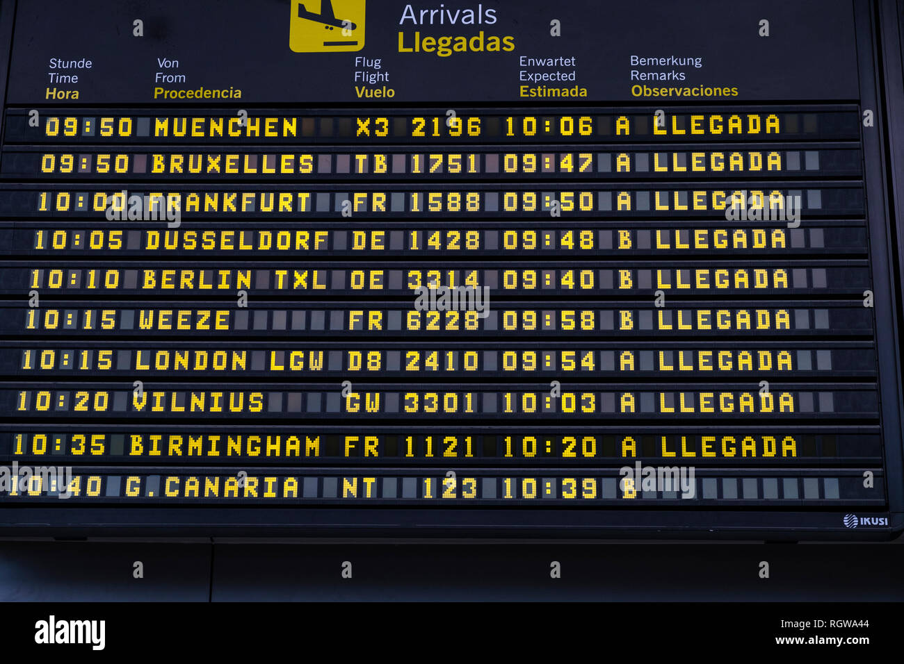 Arrivals timetable notification board at Reina Sofia Tenerife south airport, Canary Islands, Spain Stock Photo