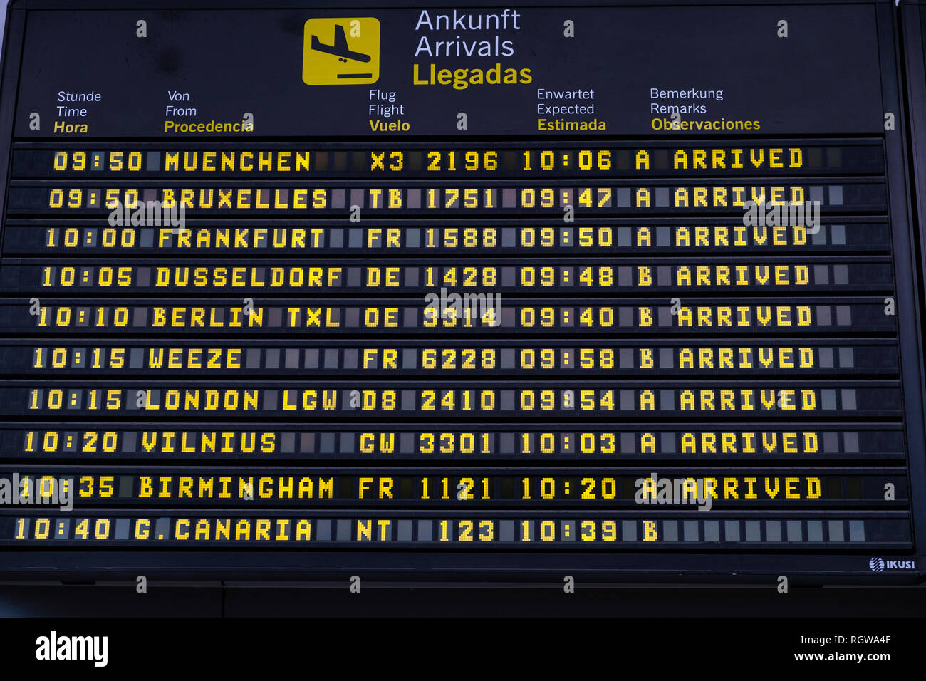 Arrivals timetable notification board at Reina Sofia Tenerife south airport, Canary Islands, Spain Stock Photo