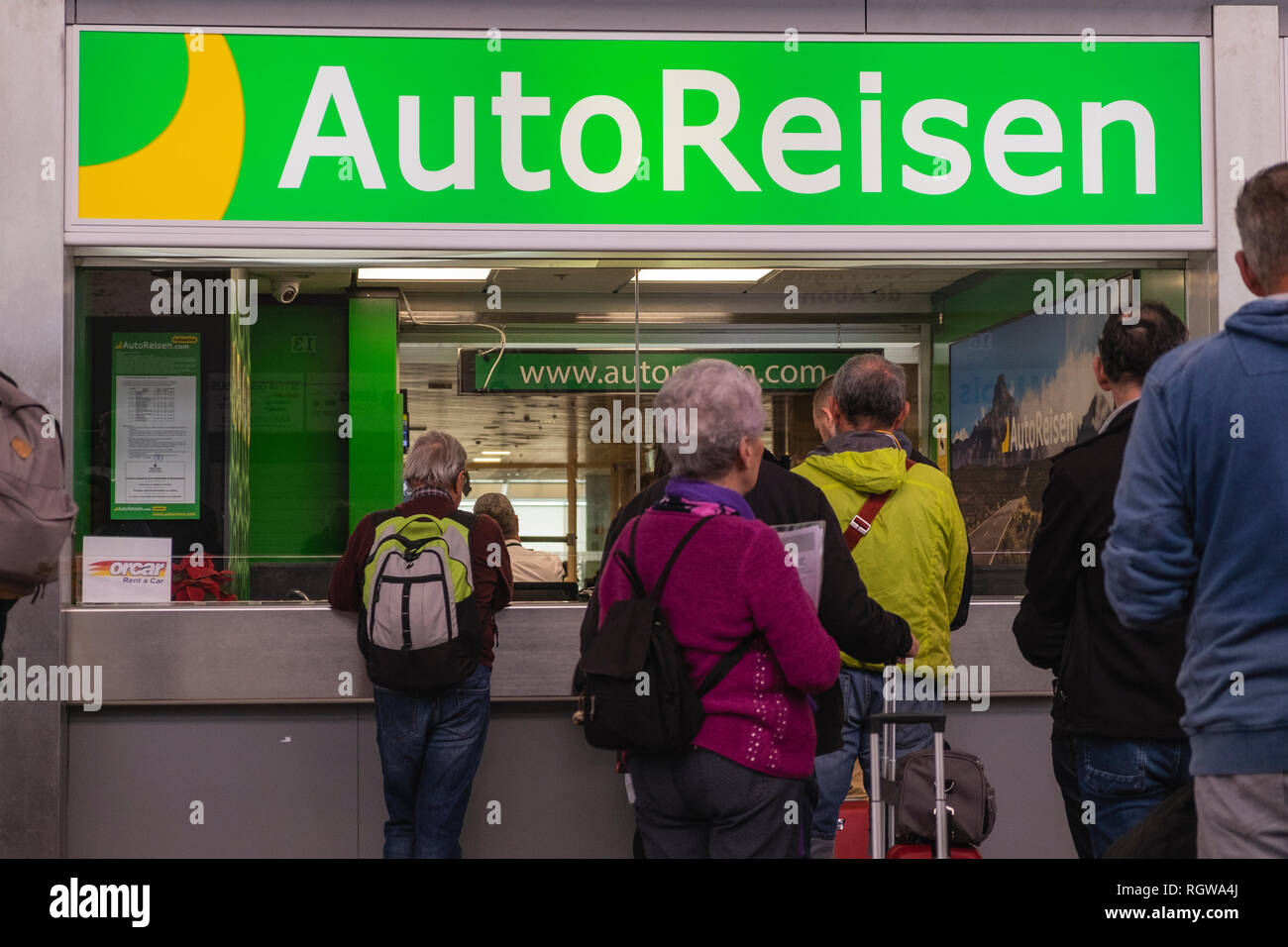 Autoreisen car rental office, counter, at Tenerife south airport arrivals area, Canary Islands, Spain Stock Photo