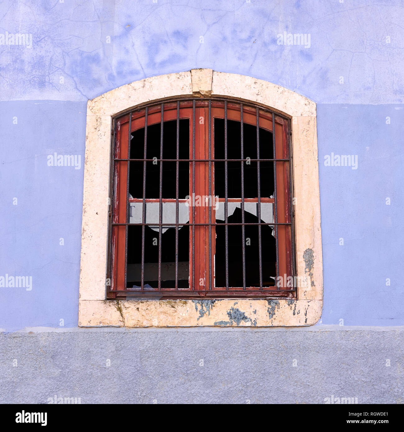 Broken window in Lisbon, Portugal Stock Photo