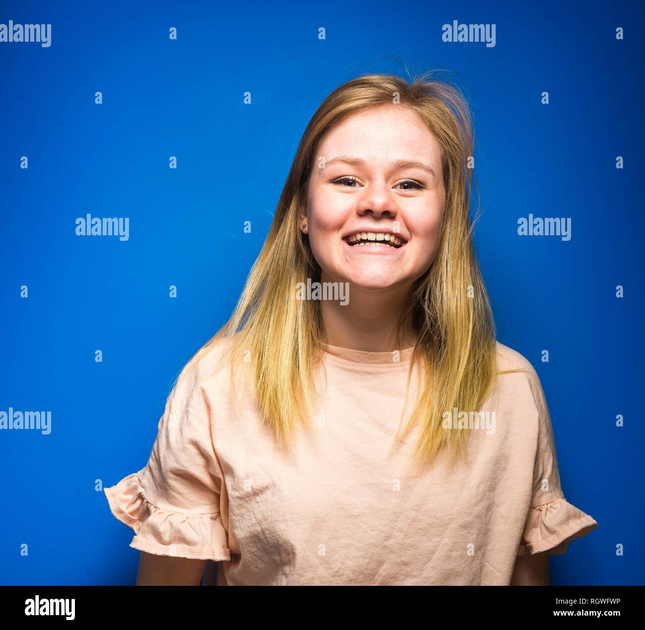 Blonde Woman posing in studio Stock Photo