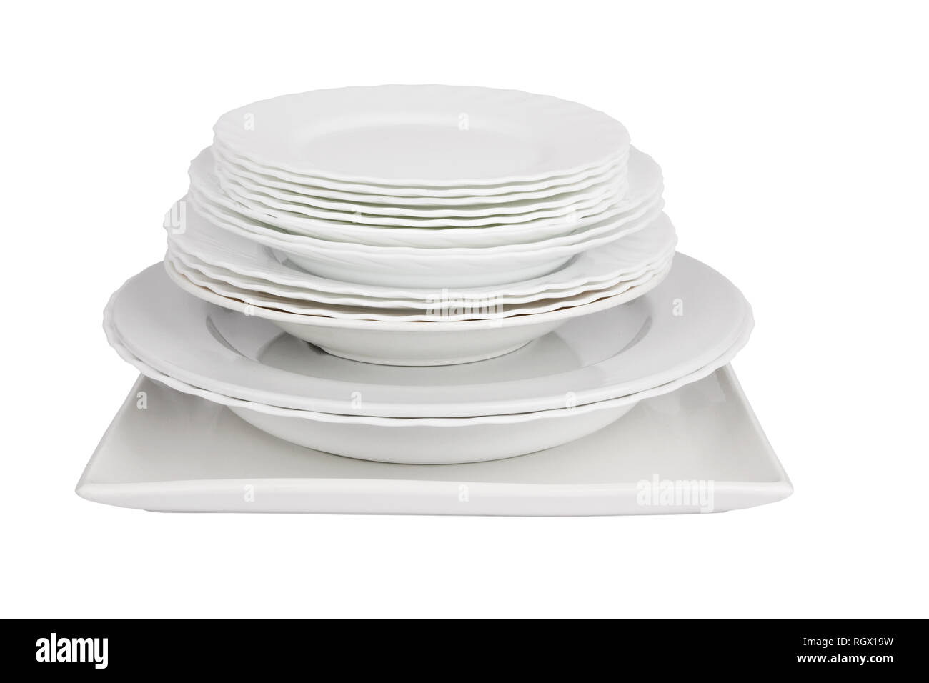 different types of white plates on a white background Stock Photo