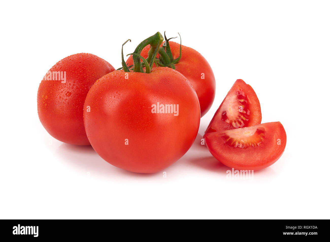Pile of fresh tomatoes isolated on white background Stock Photo - Alamy