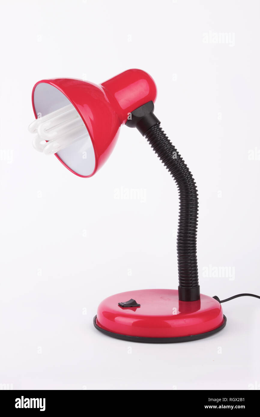 Red desk lamp on a white background Stock Photo