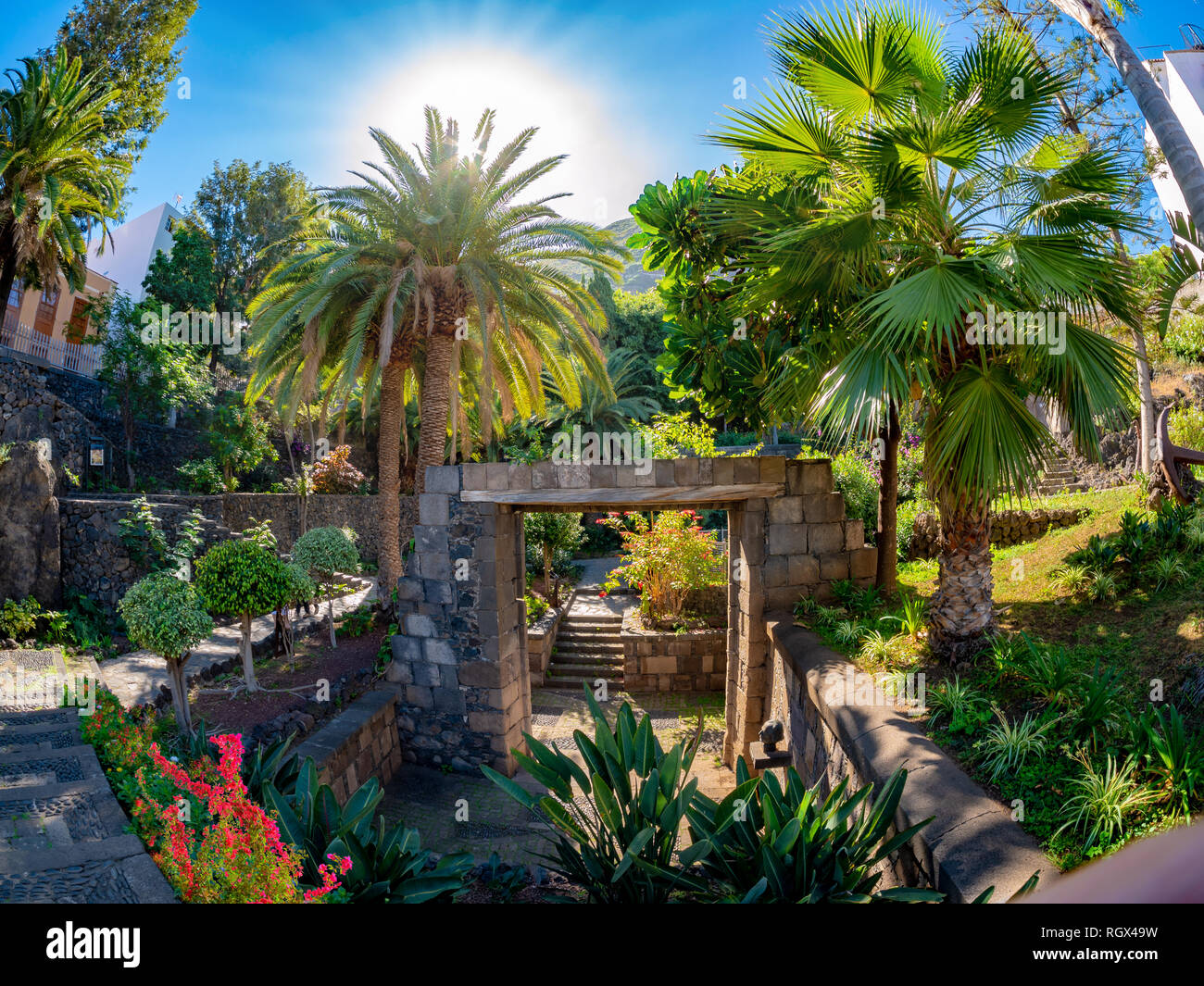 Beautiful tropical garden of Garachico village, historic remains of Puerta de Tierra in Tenerife - Canary island Stock Photo