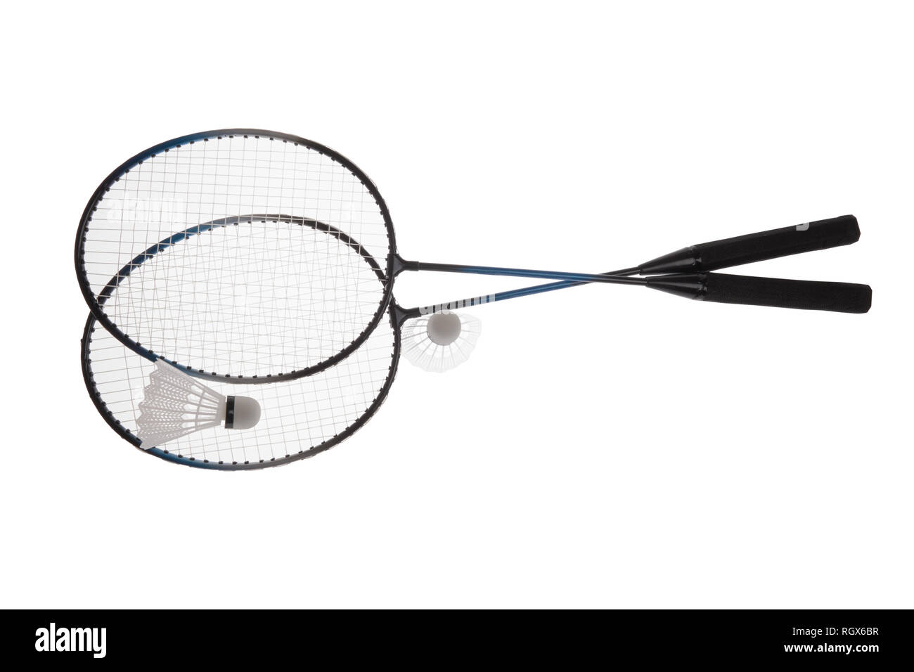 Badminton rackets and shuttlecock isolated on white background Stock