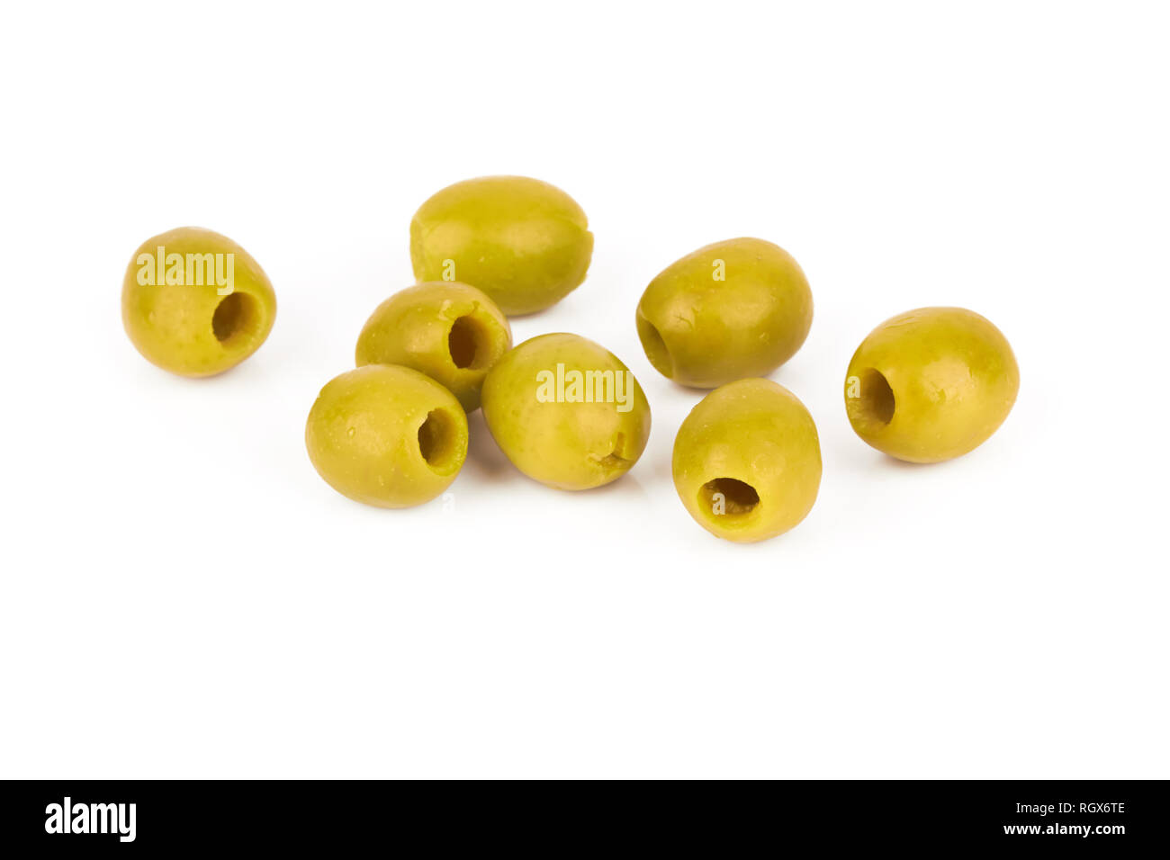 green olives isolated on a white background Stock Photo - Alamy