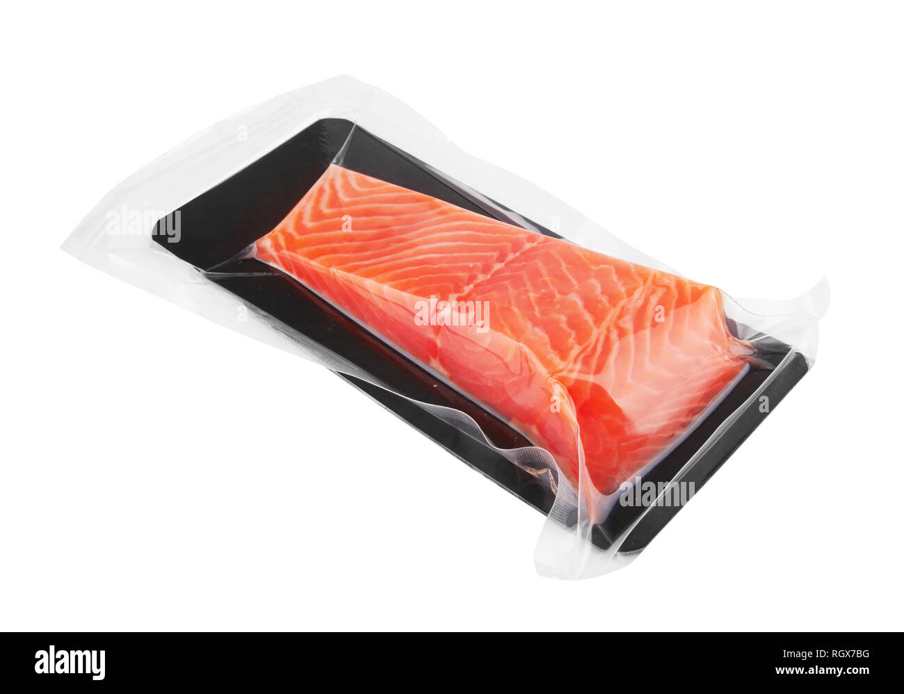 Fillet of salmon vacuum packed isolated on white background Stock Photo
