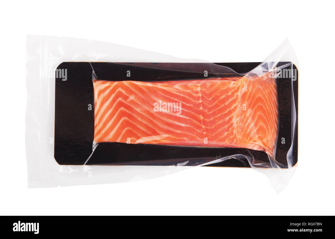 Fillet of salmon vacuum packed isolated on white background Stock Photo