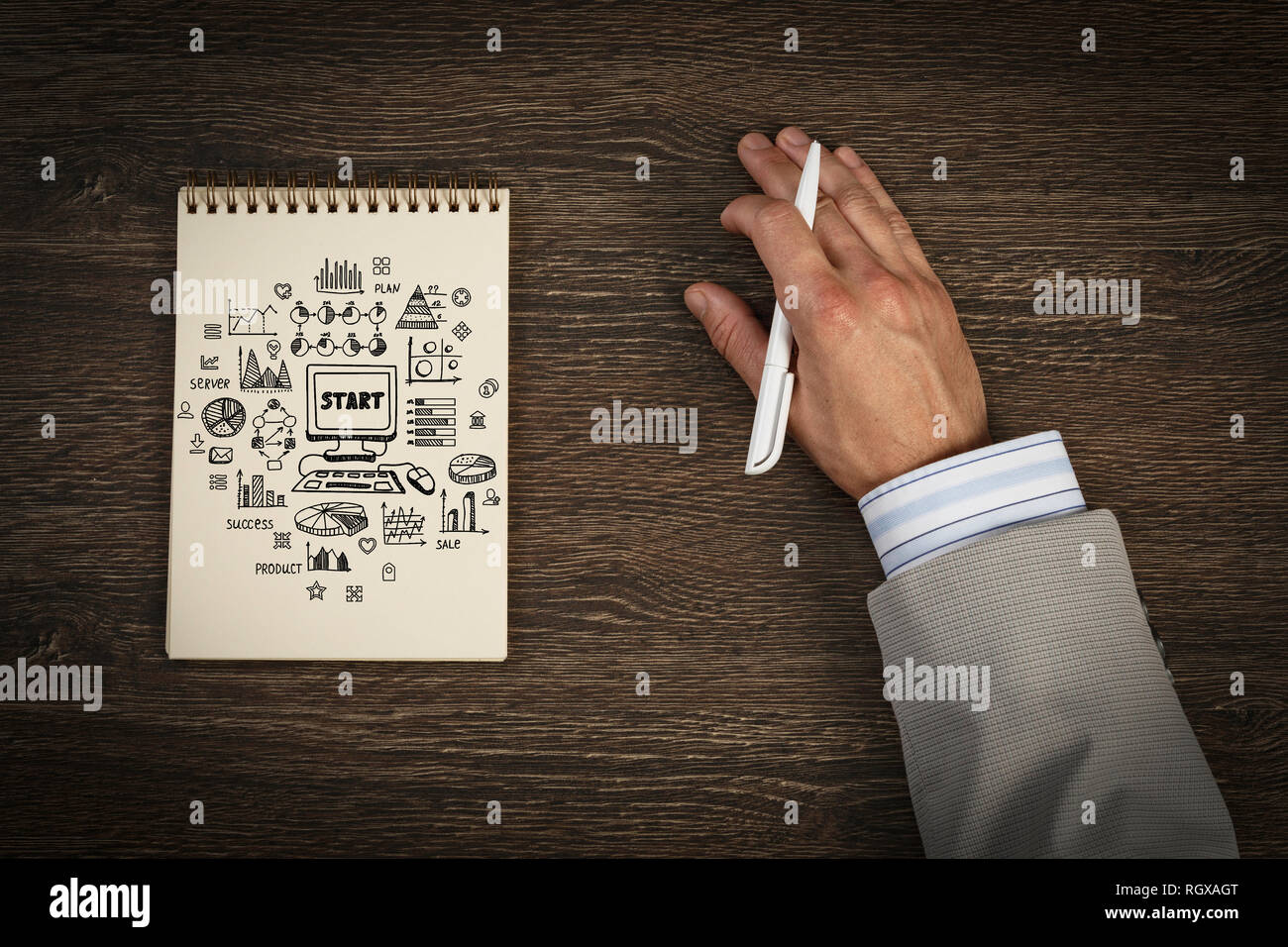 Top view of businessman at workplace and notepad with sketches Stock ...