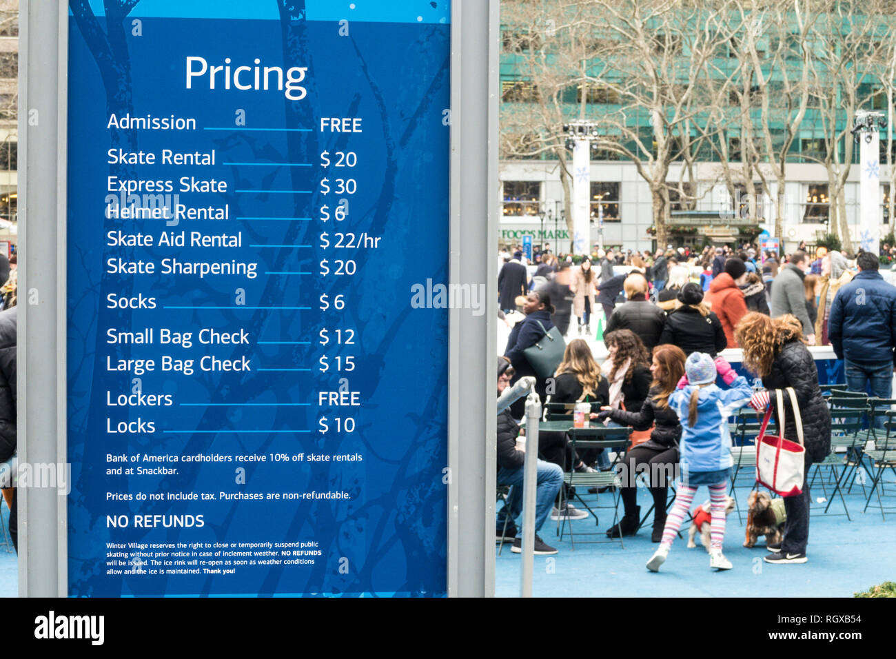 Pricing sign at the ice rink in Bryant Park, New York City, USA Stock Photo