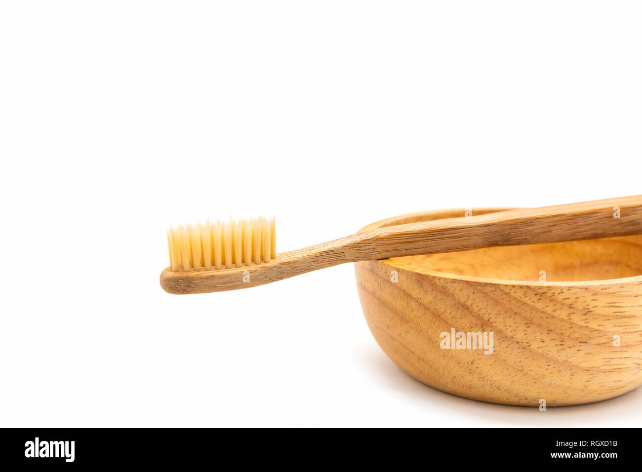 Close up bamboo toothbrush on white background Stock Photo - Alamy