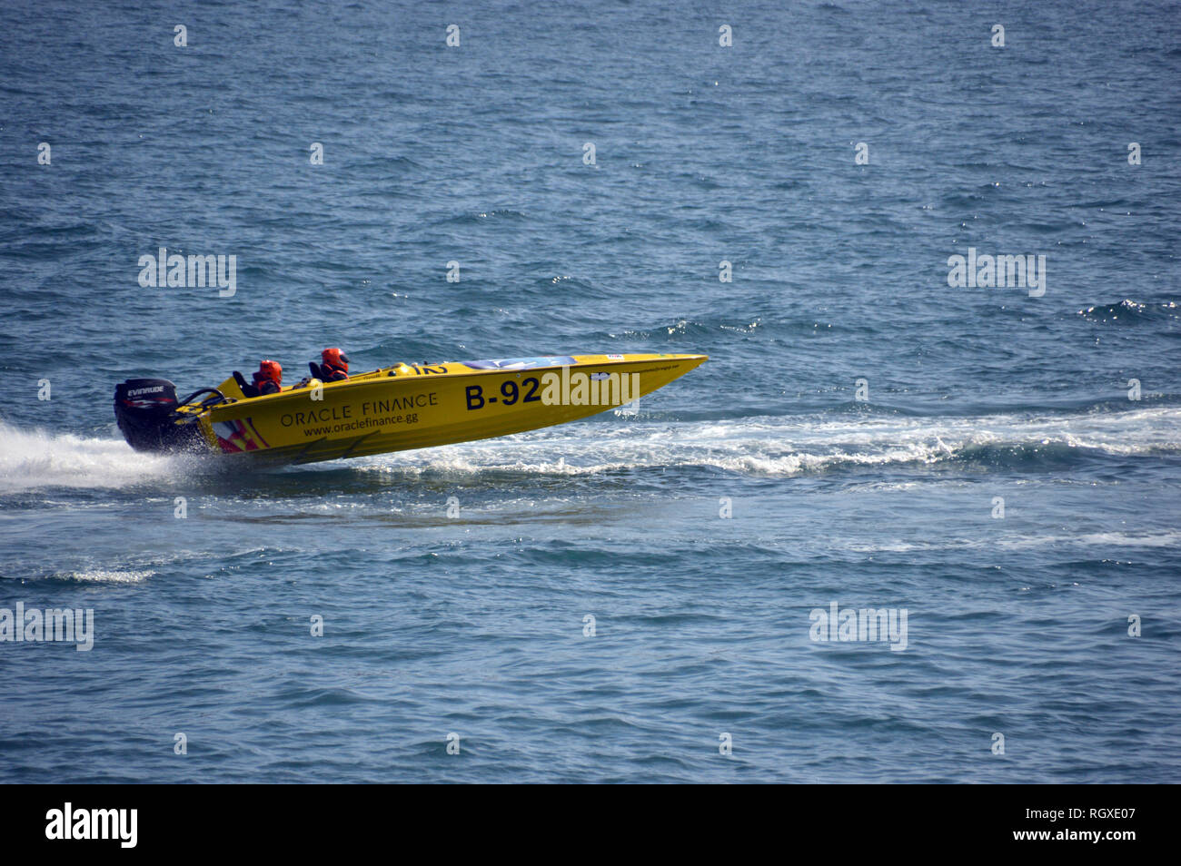 A Yellow Power Boat Racing in Havelet Bay, St Peter Port, Guernsey, Channel Islands.UK. Stock Photo