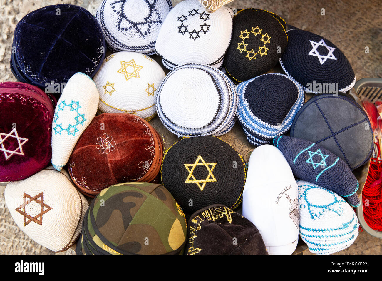 Yarmulkes, Jewish Hat Cover, Kippah with Israeli Star of David sells as a Souvenirs in Old city of Jerusalem. Jewish headwear - Image Stock Photo