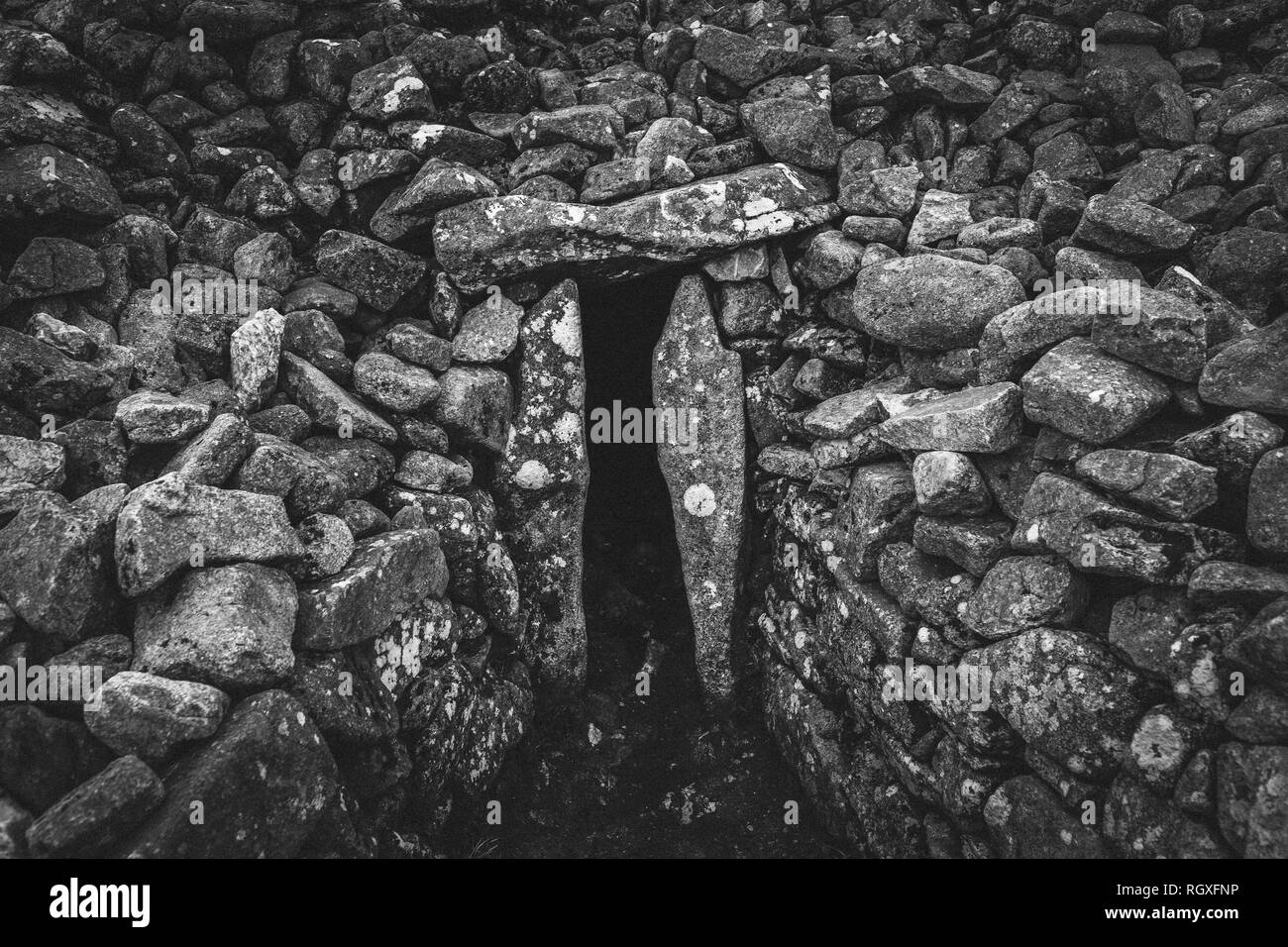 Entrance to the Irish Megalithic Passage Burial Tomb located on a summit of Seefin Mountain, Wicklow, Ireland dating back to the Neoltic Period. Stock Photo