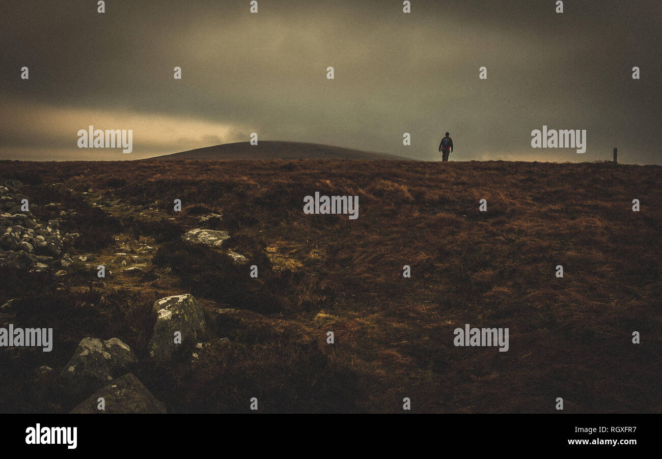 Hill walking on the Seefin mountain in County Wicklow, Ireland Stock Photo