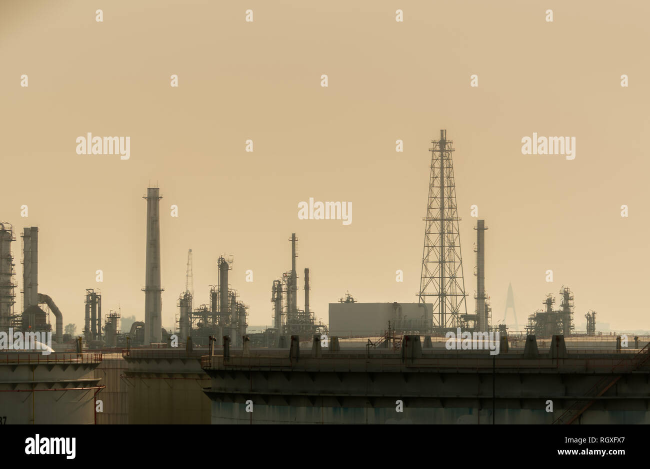 Air pollution at oil petroleum refinery plant. Bad air quality filled