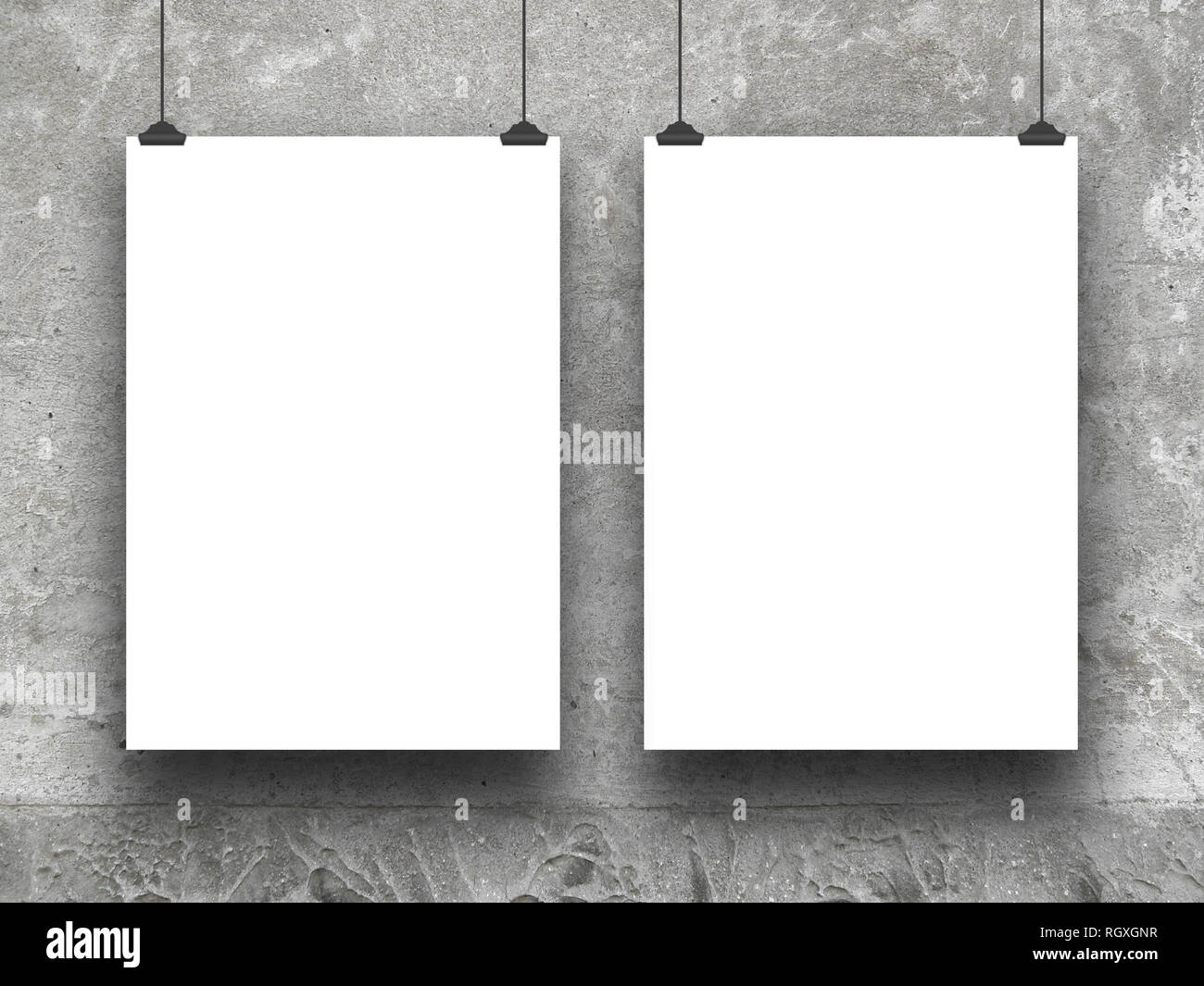 Two blank frames against gray concrete wall background Stock Photo