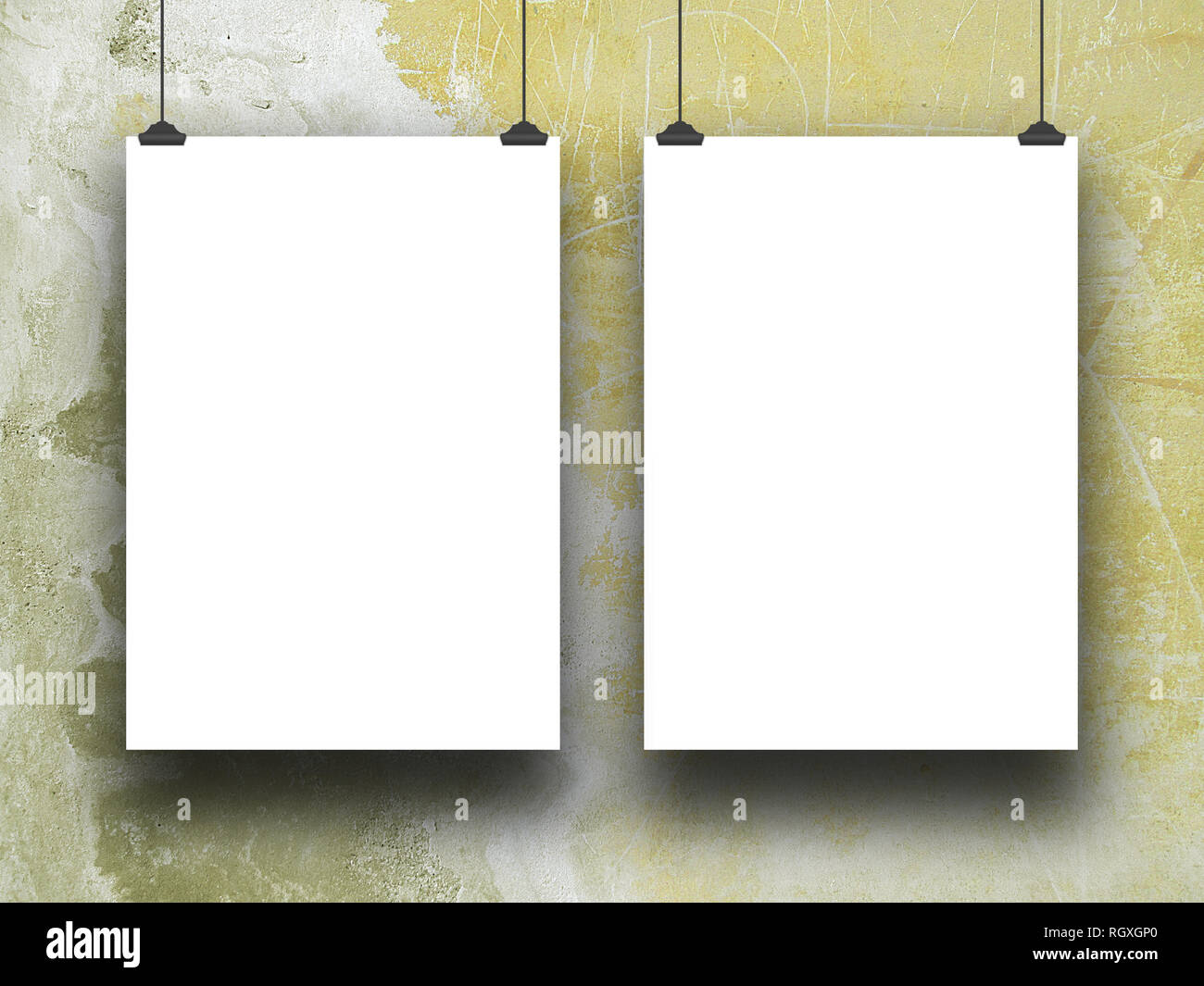 Two blank frames against white and yellow concrete wall background Stock Photo