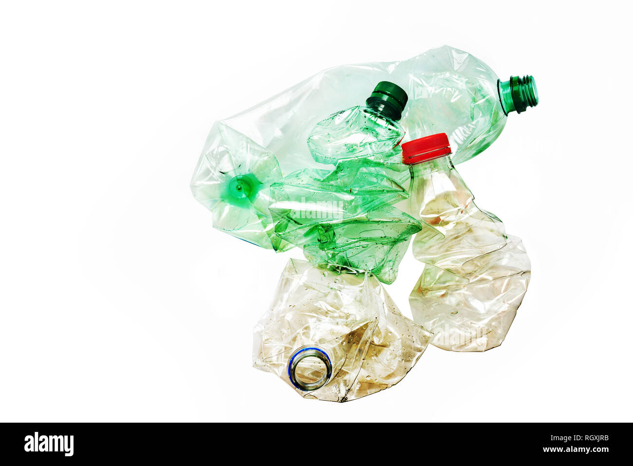 Crushed Plastic Bottle Isolated Stock Photos & Crushed Plastic Bottle