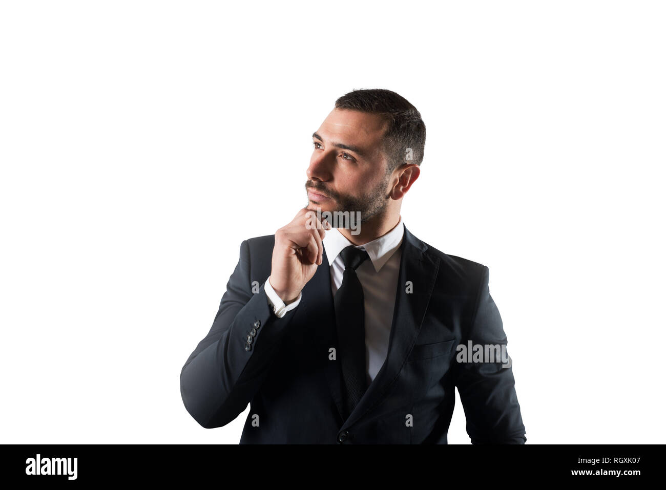 Businessman thinks new strategies to grow up the company. Isolated on white background Stock Photo