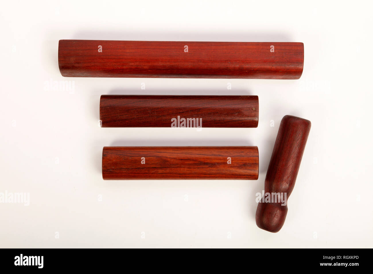 Solid Rosewood bars as wood blocks, with solid rosewood beater. Resonance, Musical instrument. Percussion. Stock Photo