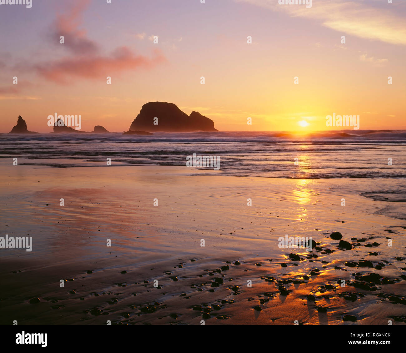 USA, Oregon, Sunset and Three Arch Rocks near Oceanside. Stock Photo