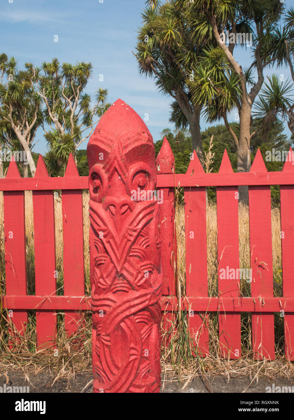 Pou whenua post in tuahu sacred enclosure, Turuturu Mokai pa, Hawera, Taranaki, New Zealand. Ngati Tupaia hapu of Ngati Ruanui are kaitiaki guardians. Stock Photo