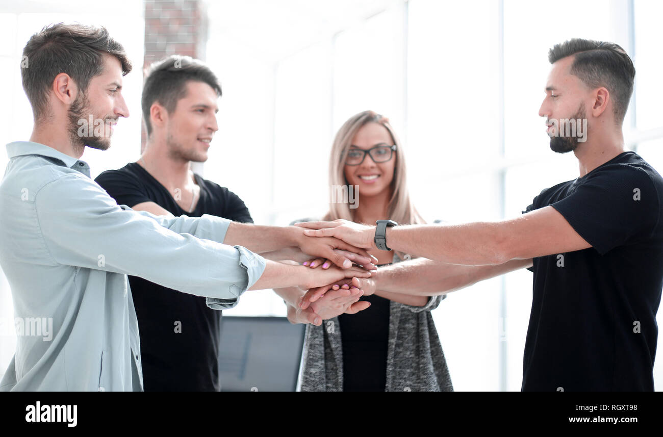 Business people teamwork stacking hands Stock Photo - Alamy