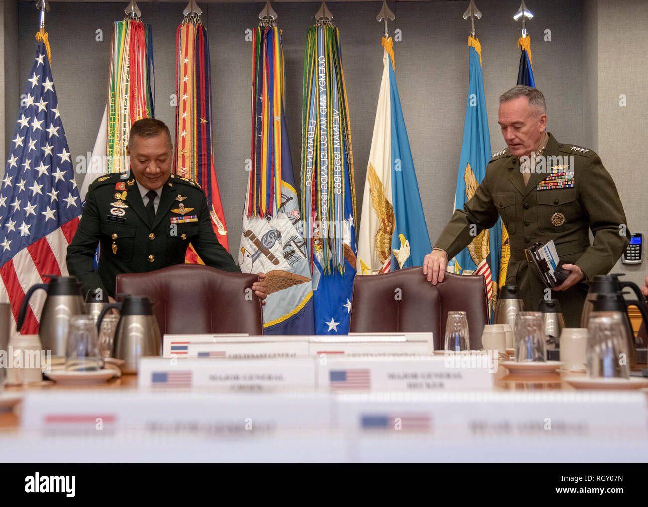 Marine Corps Gen. Joe Dunford, chairman of the Joint Chiefs of Staff, hosts his counterpart Chief of Defence of the Royal Thai Armed Forces Gen. Pornpipat Benyasri at the Pentagon, Jan. 29, 2019. DoD Photo by Navy Petty Officer 1st Class Dominique A. Pineiro Stock Photo