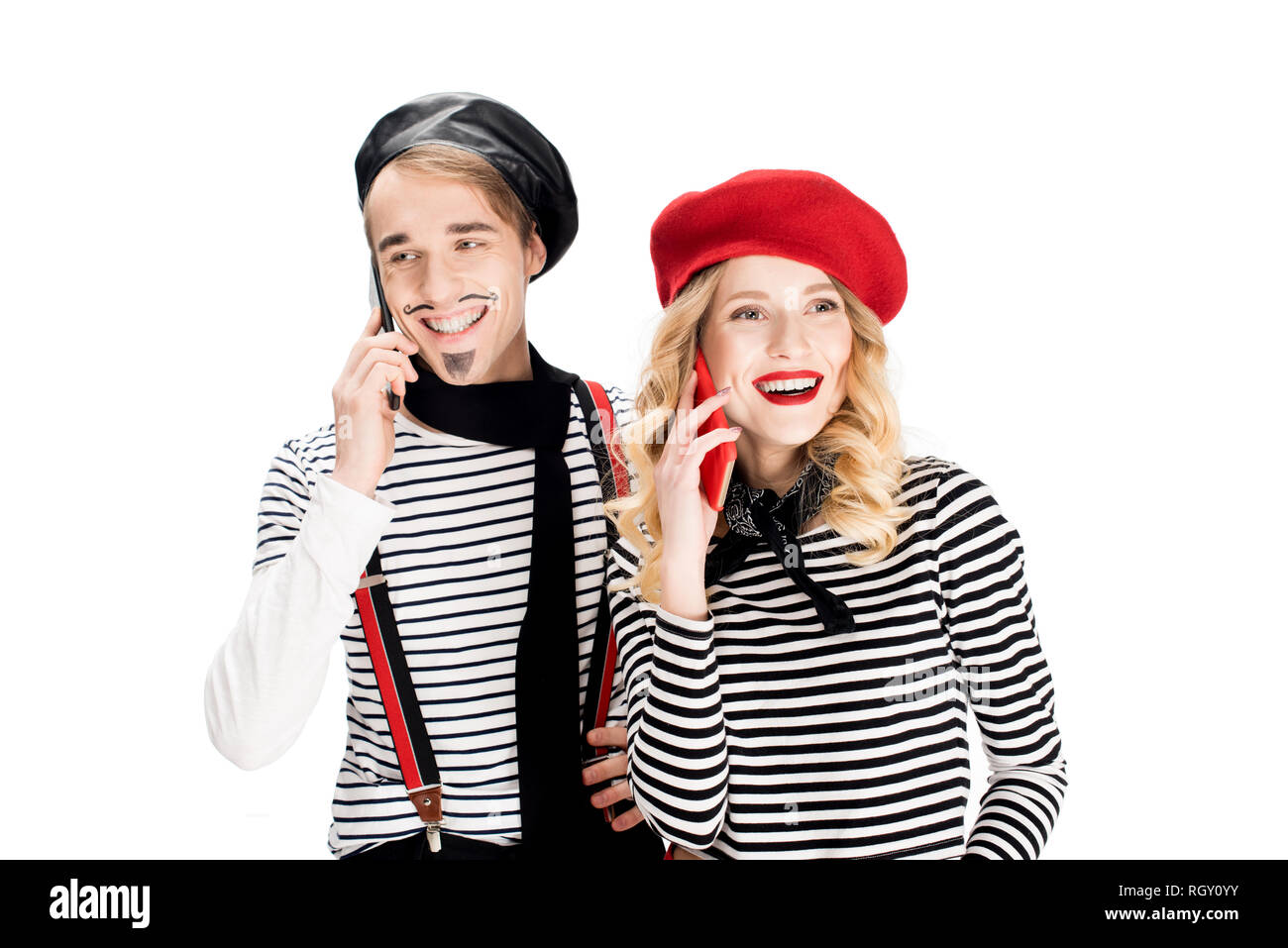 french couple in berets using smartphones while sitting on chairs isolated  on white Stock Photo - Alamy
