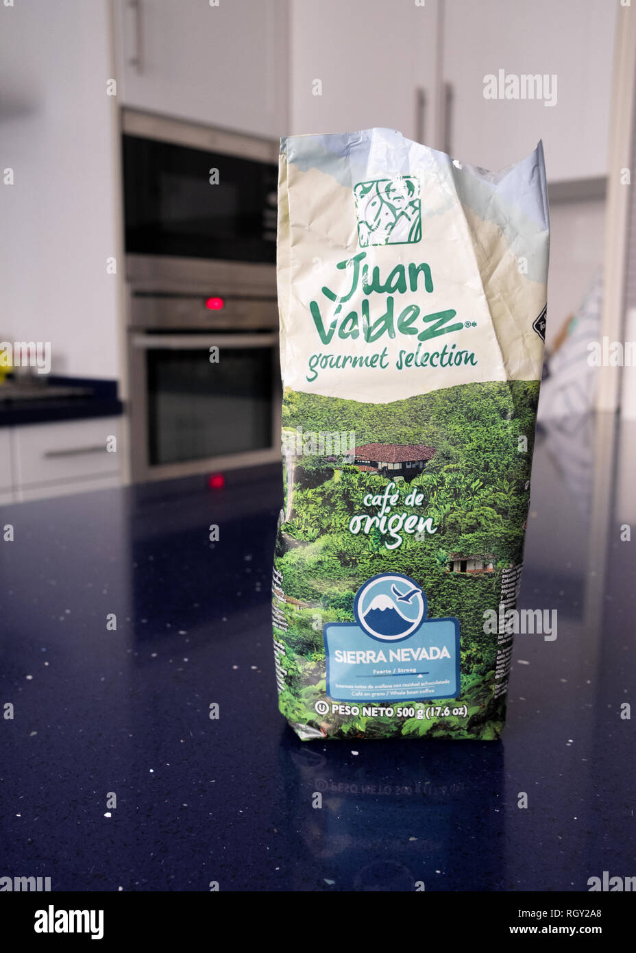 Juan Valdez gourmet selection café de origen Sierra Nevada premium colombian coffee package in a modern kitchen worktop Stock Photo
