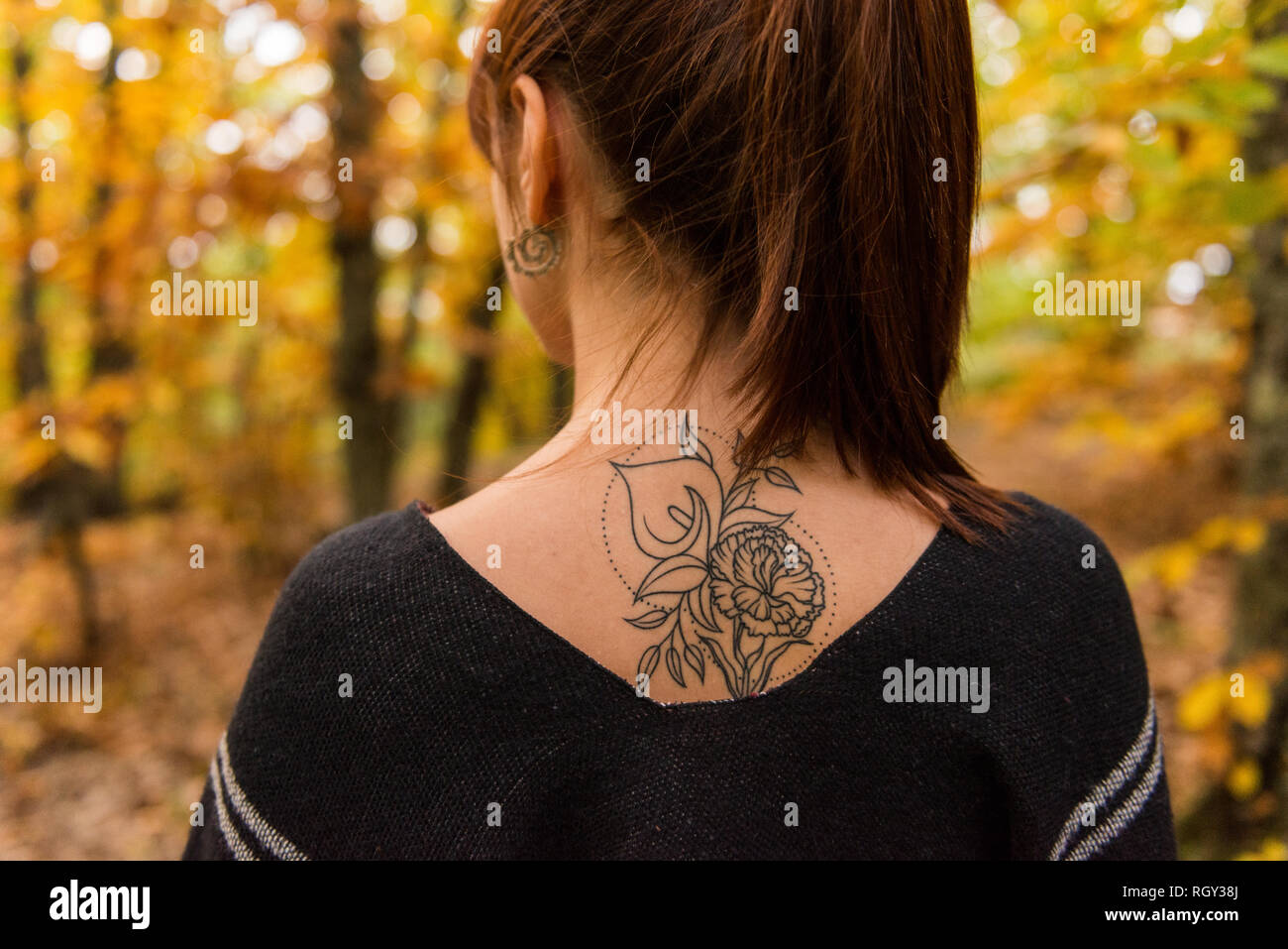 Neck tattoo woman hi-res stock photography and images - Alamy