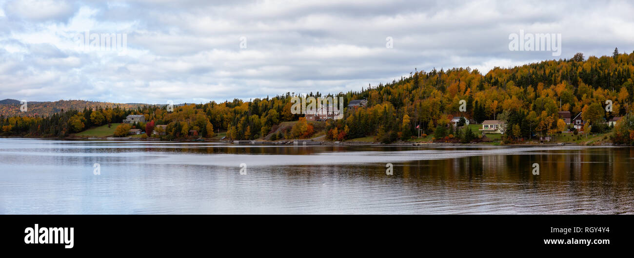 Beautiful panoramic landscape view of residential homes by the lake
